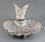 A Chinese Canton enamel 'shell' basin and ewer, mid 18th century, decorated with alternating