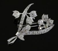 A white gold? and three colour diamond floral spray brooch set with round, old and rose cut