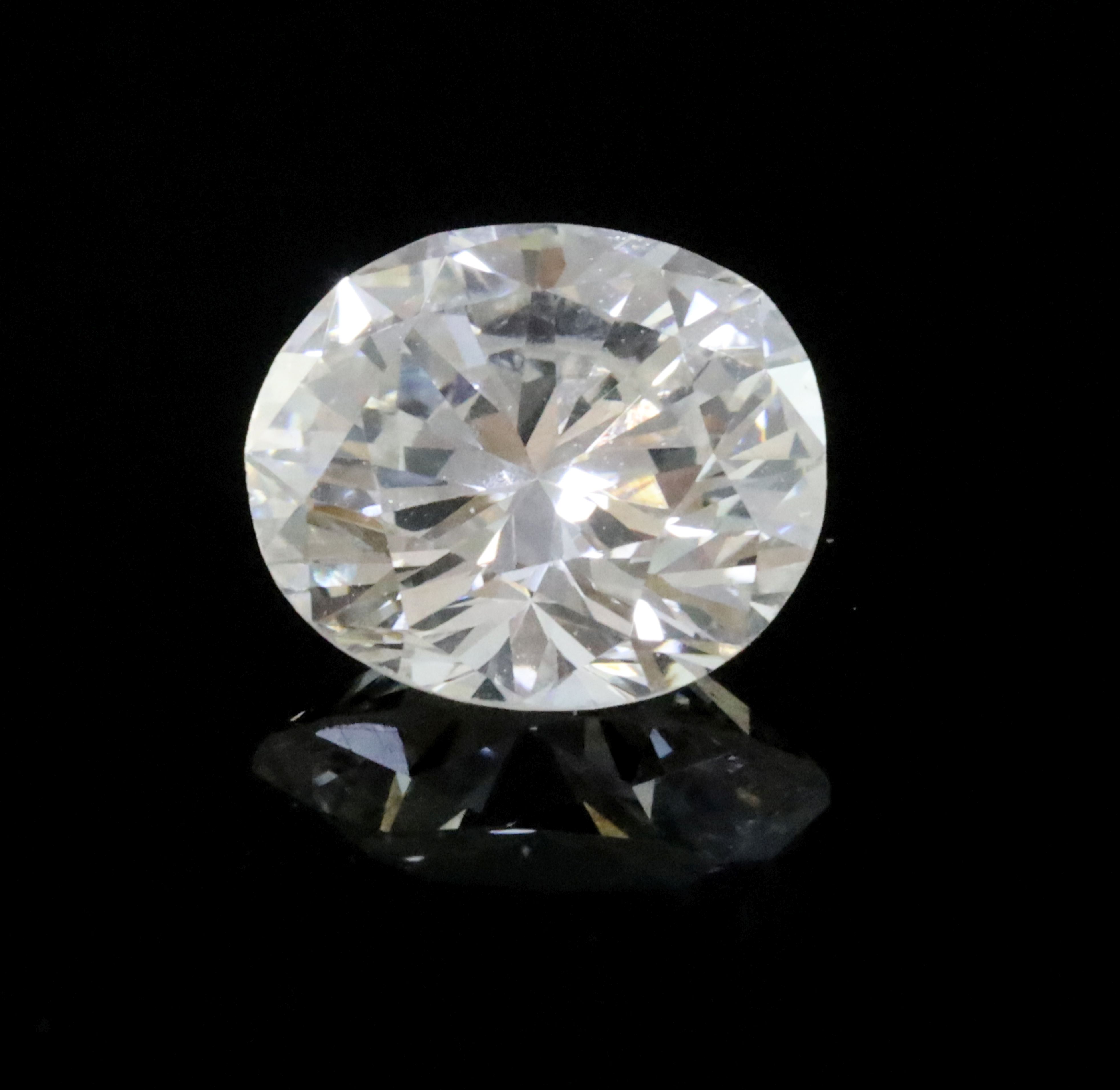 An unmounted round brilliant cut diamond, weighing approximately 0.95cts,