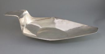 A large 1960's silver dish designed and made by A. Rawlinson and retailed by Asprey, of stylised