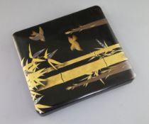 A Japanese lacquer writing box (suzuribako), early 20th century, the cover gold lacquered and