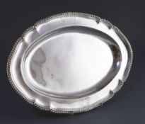 A George III silver oval meat dish, by John Parker & Edwin Wakelin, with gadrooned border and