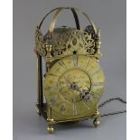 Thos. Muddle of Rotherfield. A 17th century brass lantern clock, with Roman dial and engraved