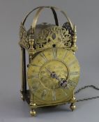 Thos. Muddle of Rotherfield. A 17th century brass lantern clock, with Roman dial and engraved