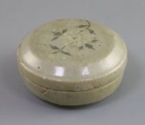 A Korean inlaid celadon cosmetics jar and cover, Koryo dynasty (AD 918-1392), the cover inlaid in