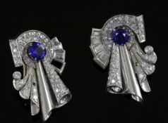 A pair of diamond and sapphire clips in white metal settings (tests as platinum), white metal