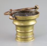 A 15th century German or Flemish brass Holy Water bucket, with pierced cast handle, with dog's