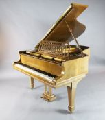 A Steinway & Sons figured walnut boudoir grand piano, with iron frame, with cast inscription '