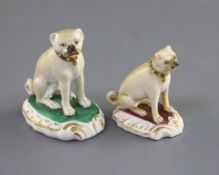 Two Rockingham porcelain figures of seated pugs, c.1830, each on a rococo moulded base, both