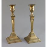 A pair of George III gun metal candlesticks, cast by Christopher Pinchbeck Jnr. (1710-1783), and
