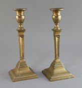 A pair of George III gun metal candlesticks, cast by Christopher Pinchbeck Jnr. (1710-1783), and