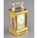 An Edwardian ormolu and porcelain hour repeating carriage clock, with architectural case and