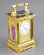 An Edwardian ormolu and porcelain hour repeating carriage clock, with architectural case and