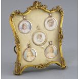 An early 20th century set of five painted miniatures of infants, one in split pearl set gold