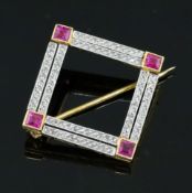 A mid 20th century gold, ruby and diamond square openwork brooch, set with square cut rubies to each