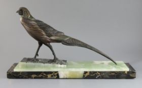 After Irénée Rochard (French 1906-1984). An Art Deco bronzed spelter model of a pheasant, on three