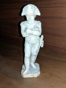 A 19th century French carved ivory figure of Napoleon, height 6.1in.