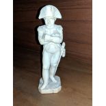 A 19th century French carved ivory figure of Napoleon, height 6.1in.