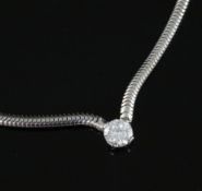 A white metal and single stone diamond set chain and snakelink, choker necklace, the large stone