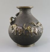 A Japanese bronze 'elephant' vase, Meiji period, the shoulder cast and applied with a procession
