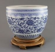 A small Chinese blue and white jardiniere, 18th century, painted with lotus flowers and scrolling