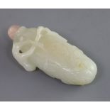A Chinese white jade snuff bottle, 19th century, in the form of a gourd carved in relief with