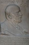 A bronze relief portrait plaque of Milton V. Ely C.B.E, presented by his employee's on the 50th