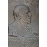 A bronze relief portrait plaque of Milton V. Ely C.B.E, presented by his employee's on the 50th