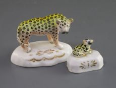 A Staffordshire porcelain figure of a leopard and a similar figure of a cub, c.1835-50, possibly