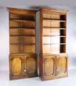 A pair of Victorian mahogany open bookcases, with moulded cornices and four adjustable shelves