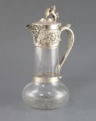 A late Victorian silver mounted glass claret jug, by Horace Woodward & Co Ltd, with Bacchanalian