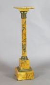 A Victorian bronze mounted sienna marble pedestal, with revolving top, W.10in. H.39.5in. (a.f.)