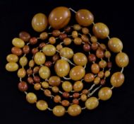 A large single strand graduated oval amber bead necklace, gross weight 200 grams, string broken with