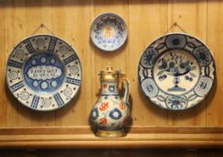 § Frederick Clifford Harrison (1901-1984)oil on boardDelftware plates and a juginitialled and