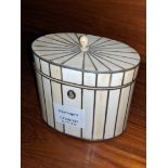 A Regency ivory veneered tea caddy, of oval from with pewter stringing, height 4.7in.