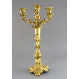 A Louis XVI ormolu four light candelabrum, decorated with foliate scroll motifs, height 17.25in.