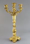 A Louis XVI ormolu four light candelabrum, decorated with foliate scroll motifs, height 17.25in.