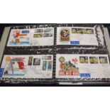 A stamp collection in albums and loose and FDC's (2 boxes)