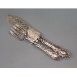 A pair of Victorian engraved silver fish servers, Birmingham, 1850.