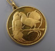 A French 18ct. gold pendant inscribed in French "Nor you without me, nor me without you" on a fine