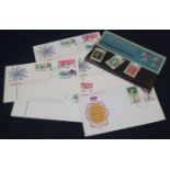 An Acme postage album Victoria to Elizabeth II assorted world covers and loose stamps