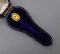 A cased Victorian yellow metal and diamond set stick pin, 71mm.