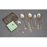 A silver and enamel compact (a.f.), a silver cigarette case and eight items of silver flatware.