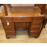 A burr walnut Georgian style pedestal desk W.92cm