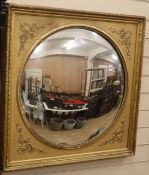 A gilt frame convex wall mirror Frame width 75cm