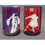 A pair of Royal Worcester Pierrot and Harlequin and Columbine bookends, designed by Doris Lindner in