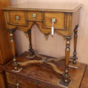 A 17th century style walnut lowboy W.72cm