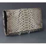 A Silvano Biagini snakeskin and leather clutch bag