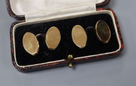 A cased pair of 18ct gold cufflinks, 14 grams.