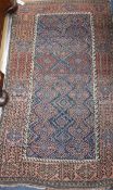 A Caucasian geometric rug, 166 x 92cm, a Belouch prayer rug and a Caucasian mat
